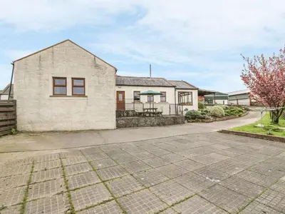 a stone driveway in front of a house at Laird House in Lockerbie