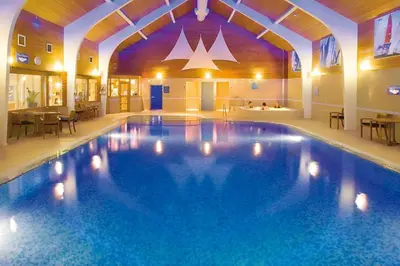 a large swimming pool in a hotel room at Cloven Stone, Nr Caldbeck ideal family accommodation with hot tub in Sebergham