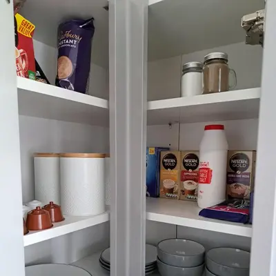 a pantry with toilet paper and other items on shelves at The Wee Bunker in Barassie