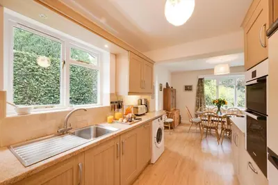 a kitchen with a sink and a stove top oven at 3 Bed in Grasmere oc-ld181 in Grasmere
