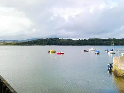 a group of boats in a large body of water at Seaview in Garlieston