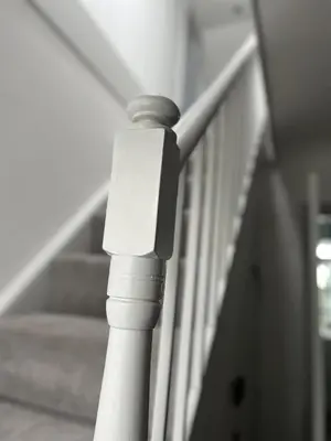 a close up of a stair case with a rail at Apple Cottage in Wigtown