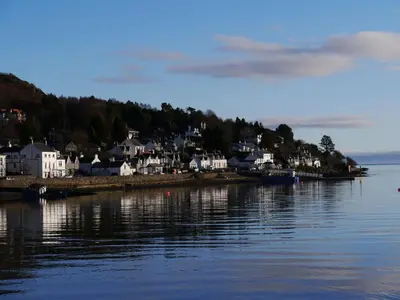 a village on the shore of a body of water at Kippford Stables in Kippford