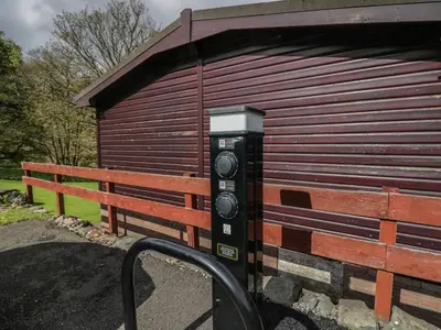 a parking meter in front of a building at Pod No 28 in Keswick