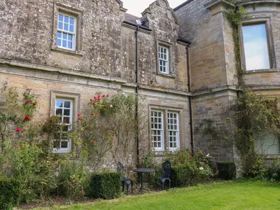 an old building with a table in the yard at The Pavillion in Carlisle