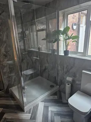 a bathroom with a shower and a toilet at Carlisle City Centre The Gavel in Carlisle