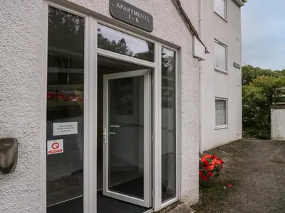 an entrance to a building with a glass door at Apartment 2 in Keswick