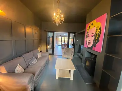 a living room with a couch and a table at Kirkcudbright 3 bed ultra modern brand new in Kirkcudbright