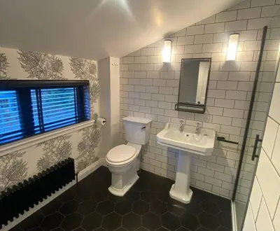 a bathroom with a toilet and a sink at Kirkcudbright 3 bed ultra modern brand new in Kirkcudbright