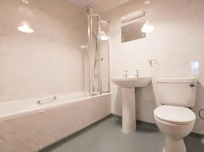 a bathroom with a toilet and a sink and a tub at 3 Bed in Threlkeld SZ083 in Threlkeld