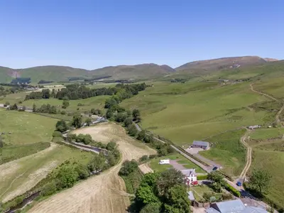 an aerial view of a farm in the hills at 3 Bed in Moffat oc-ca402 in Moffat