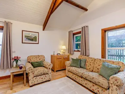 a living room with a couch and two chairs at 1 Bed in Keswick SZ516 in Keswick