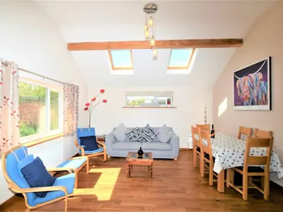 a living room with a couch and chairs at 2 Bed in Cockermouth SZ282 in Cockermouth