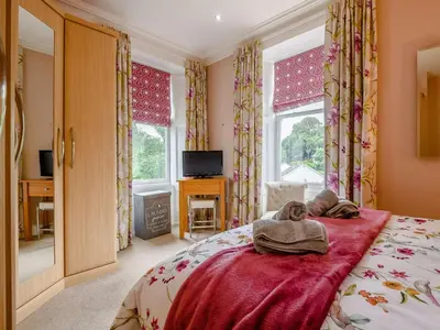 a bedroom with a bed with two towels on it at 2 Bed in Portinscale 89261 in Portinscale