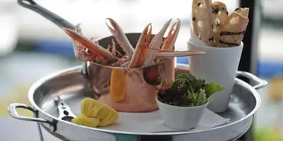 a metal tray with several cups of food on it at The Penthouse- The Kingsley Collection in Troon
