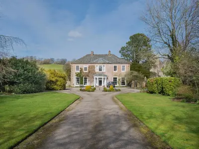 an estate with a large house with a driveway at 2 Bed in Caldbeck SZ212 in Caldbeck