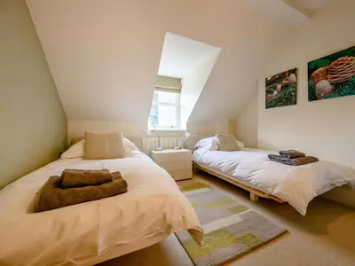 a bedroom with two beds in a attic at 4 Bed in Keswick oc-89258 in Keswick