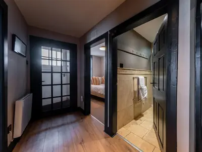 a hallway with a door leading to a bedroom at 3 Bed in Portpatrick 77308 in Portpatrick