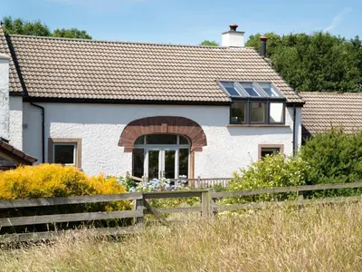 a house with solar panels on the roof at 3 Bed in Egremont oc-sz230 in Hale