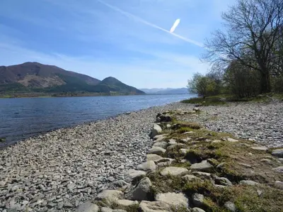 a rocky shore of a body of water at 3 Bed in Bassenthwaite 84024 in Bassenthwaite