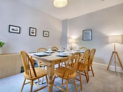 a dining room with a table and chairs at 6 Bed in Keswick oc-sz389 in Keswick