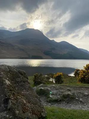 a view of a lake with mountains in the background at Daffodil Cottage in Cockermouth