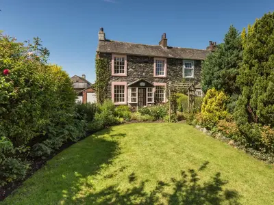 a large stone house with a large yard at 2 Bed in Keswick oc-sz415 in Bassenthwaite