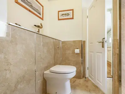 a bathroom with a toilet and a walk in shower at 3 Bed in Keswick SZ395 in Keswick