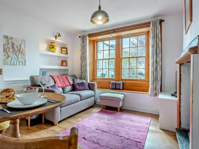 a living room with a couch and a table at 1 Bed in Keswick SZ472 in Keswick