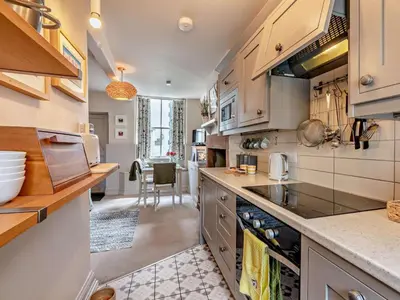 a kitchen with a sink and a counter top at 1 Bed in Keswick oc-sz112 in Keswick
