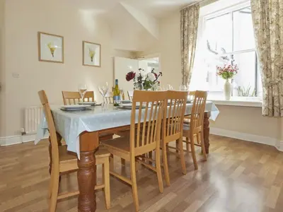 a dining room with a table and chairs at 5 Bed in Keswick oc-sz291 in Keswick