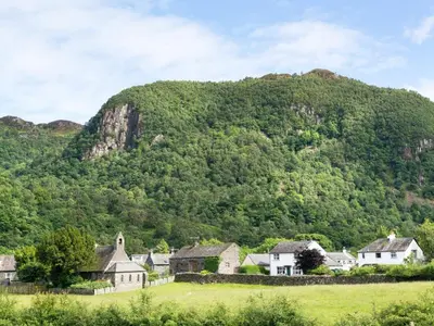 a village in front of a mountain at 4 Bed in Keswick oc-sz219 in Grange