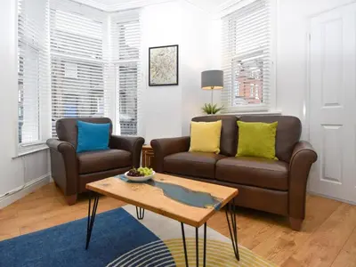 a living room with two couches and a coffee table at 3 Bed in Keswick oc-sz118 in Keswick