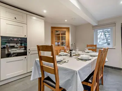 a kitchen and dining room with a table and chairs at 3 Bed in Penrith oc-sz247 in Dockray