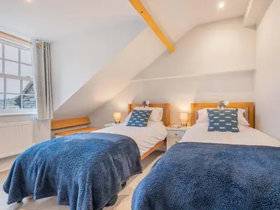 two beds in a room with a attic at 2 Bed in Keswick SZ494 in Keswick