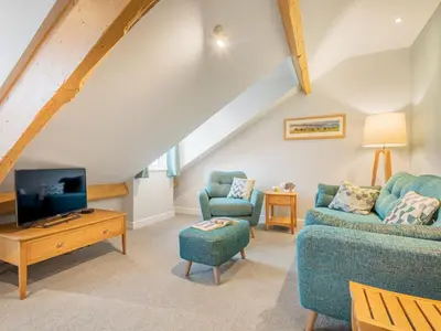 a living room with a couch and a tv at 2 Bed in Keswick SZ494 in Keswick