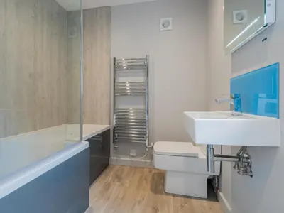 a bathroom with a sink and a toilet and a shower at 3 Bed in Keswick oc-sz029 in Keswick