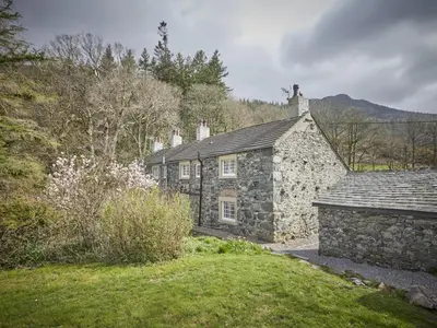 an old stone house in the middle of a field at 3 Bed in Keswick oc-sz169 in Applethwaite