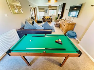 a living room with a pool table at 3 Bed in Egremont oc-90050 in Hale
