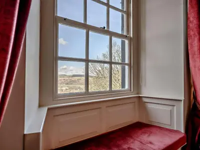 a window in a room with a red rug at 5 Bed in Cockermouth oc-91503 in Embleton