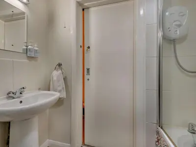 a bathroom with a shower and a sink at 2 Bed in Keswick oc-28383 in Braithwaite