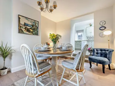 a dining room with a table and chairs at 2 Bed in Bridekirk 93280 in Bridekirk
