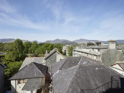an aerial view of a city with roofs at 1 Bed in Keswick SZ468 in Keswick