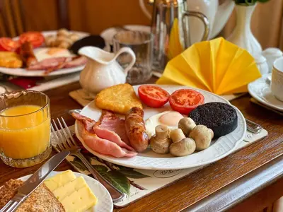 a plate of breakfast food on a table at Number 10 Bed & Breakfast in Keswick