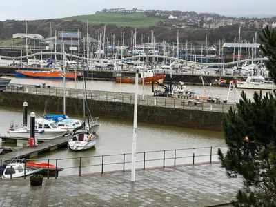 a group of boats docked at a marina at Quayside Apartment -2 Bedrooms - Sleeps 4 in Whitehaven