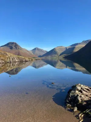 a view of a lake in the middle of a mountain at Burnthwaite Farm B&B in Wasdale
