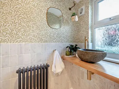 a bathroom with a sink and a mirror at 6 Bed in Keswick 94361 in Keswick