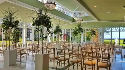 a room with rows of chairs in a room with windows at Lochgreen House Hotel & Spa in Loans