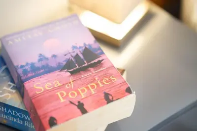 two books sitting on top of a table at Serene Retreat in Chapel Stile by LetMeStay in Ambleside