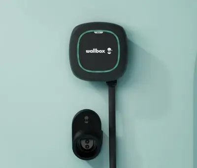 a car charger with a cell phone plugged in at Ashbrooke Apartment Keswick at The Lairbeck in Keswick